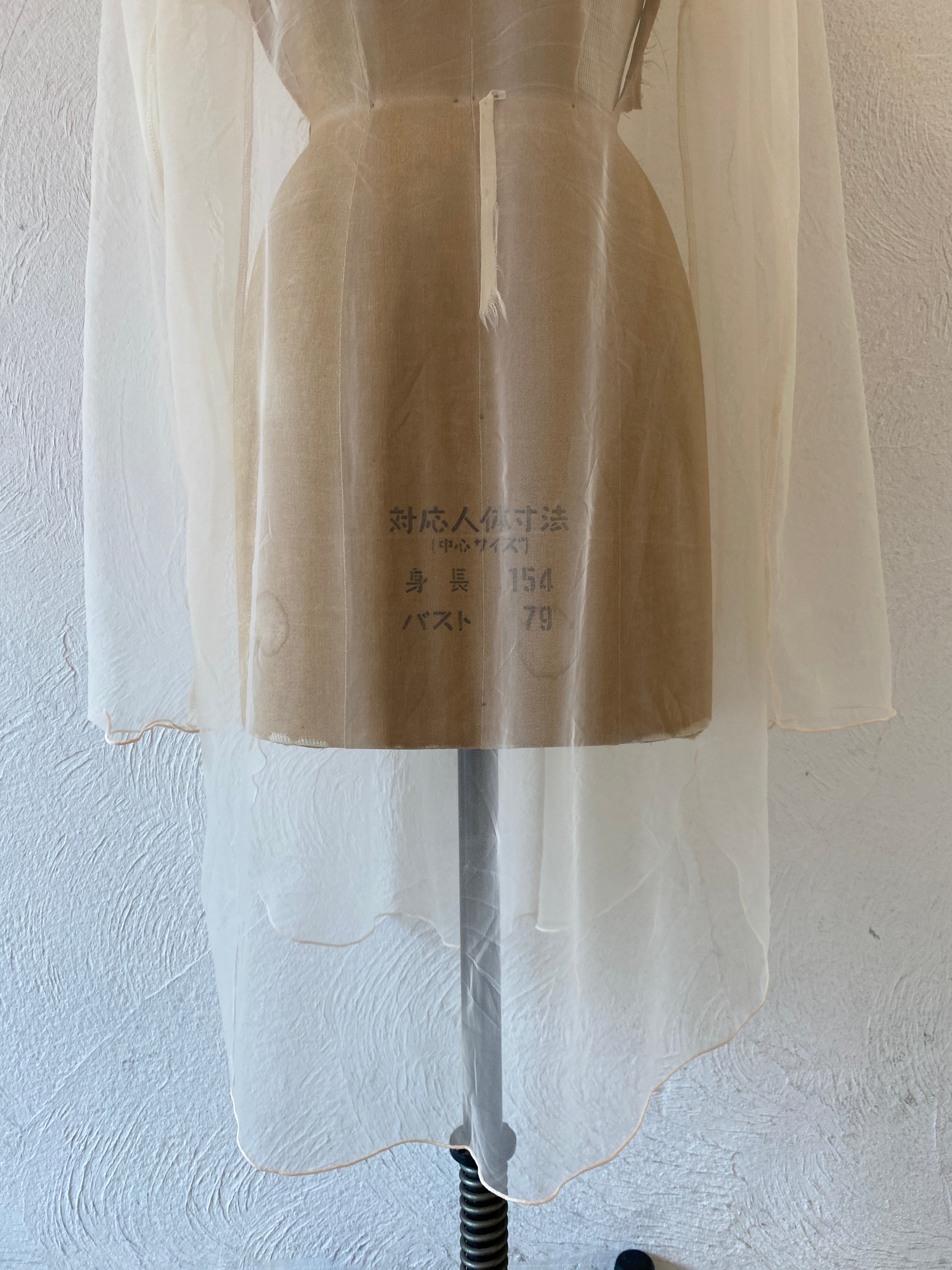 nude through dress