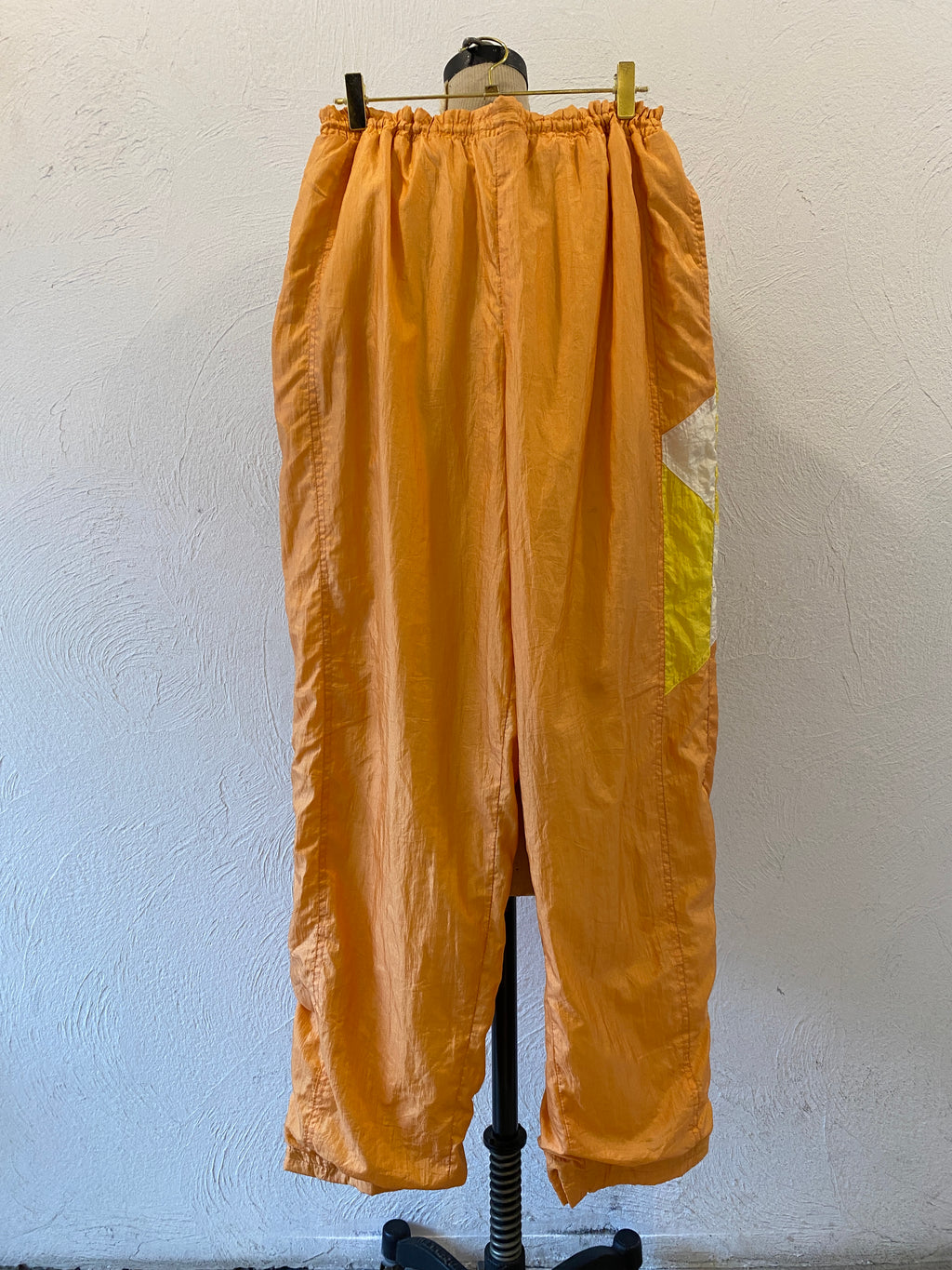 orange nylon pants