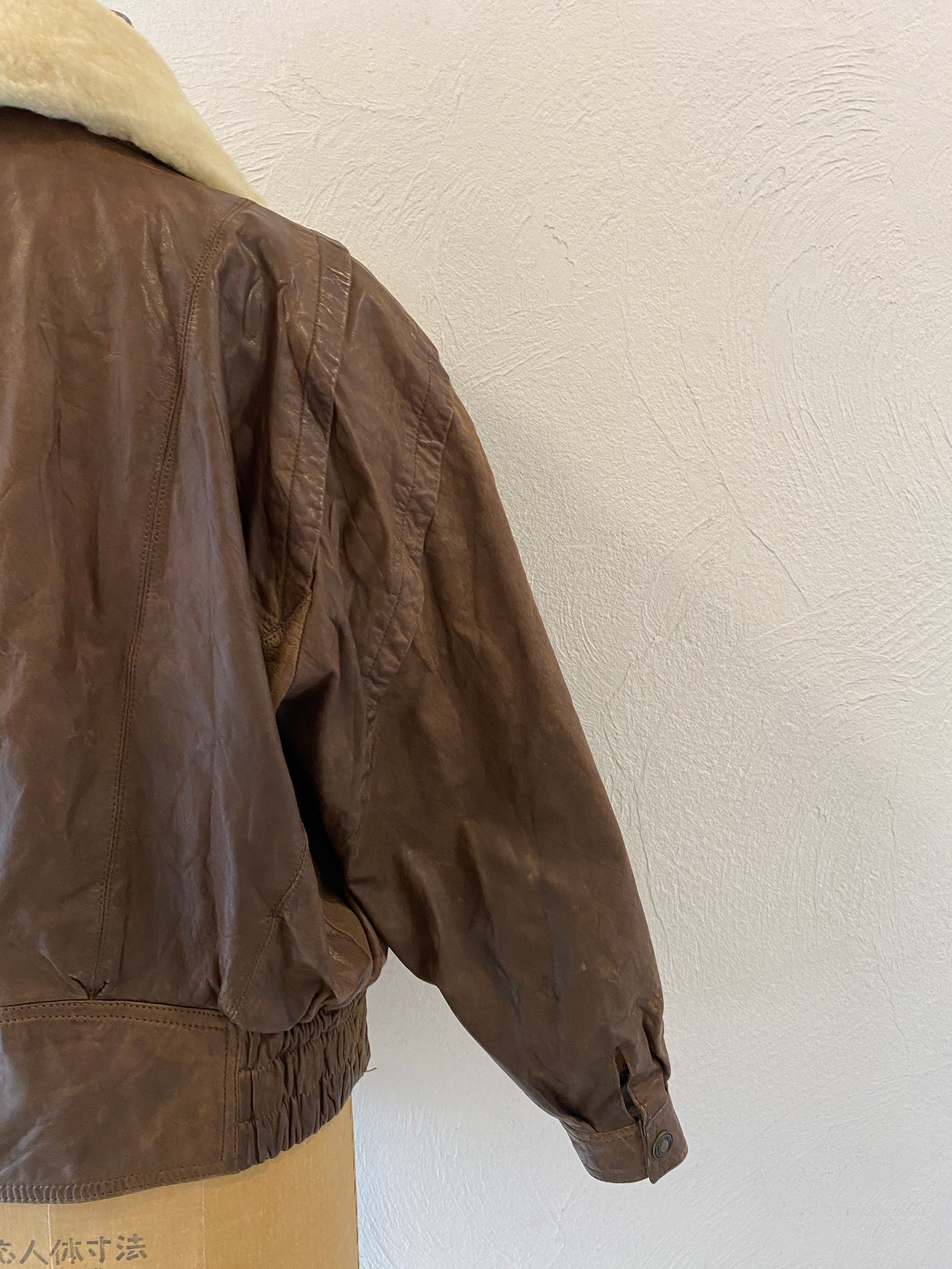 leather boa blouson