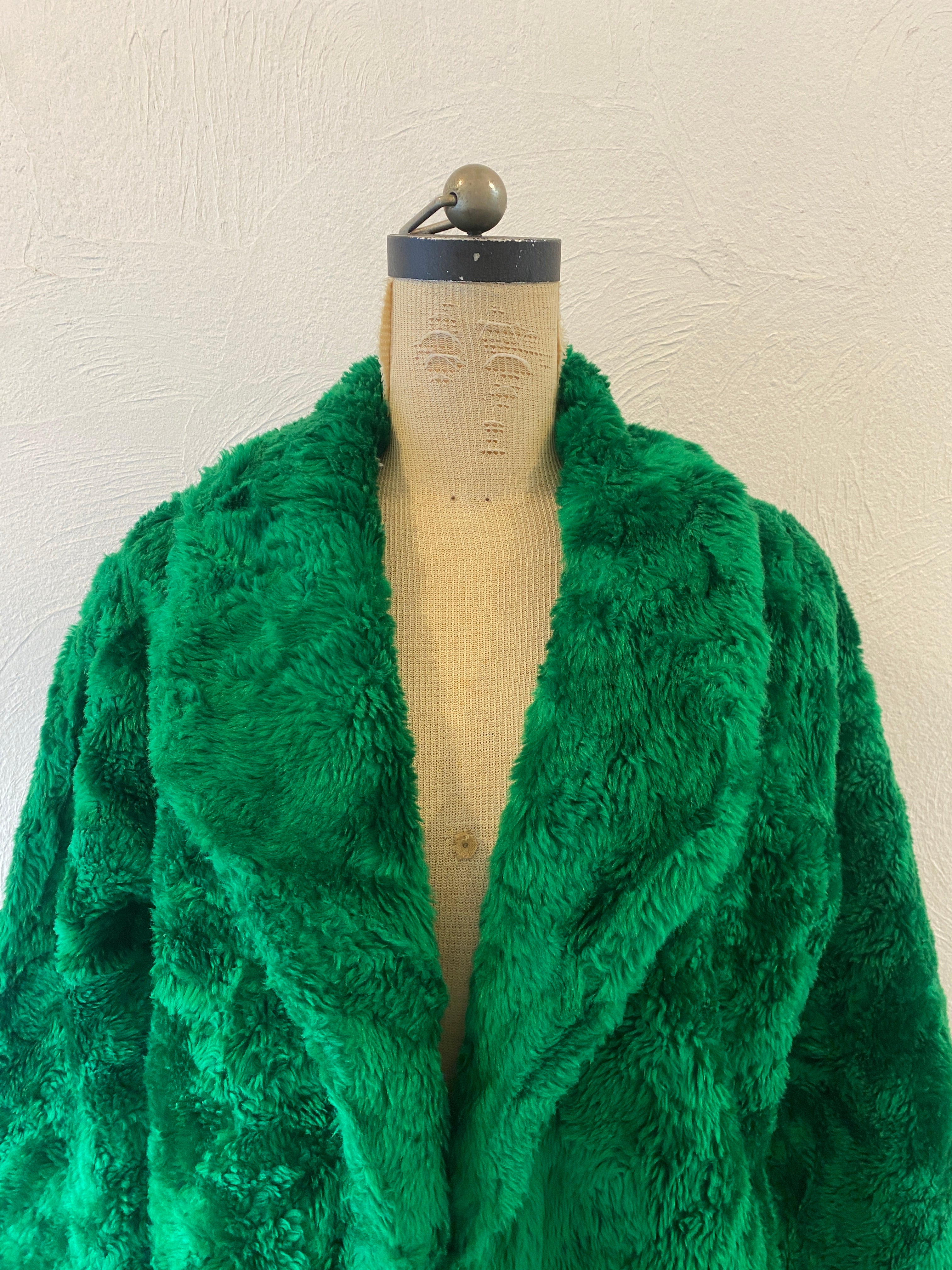 green fur coat
