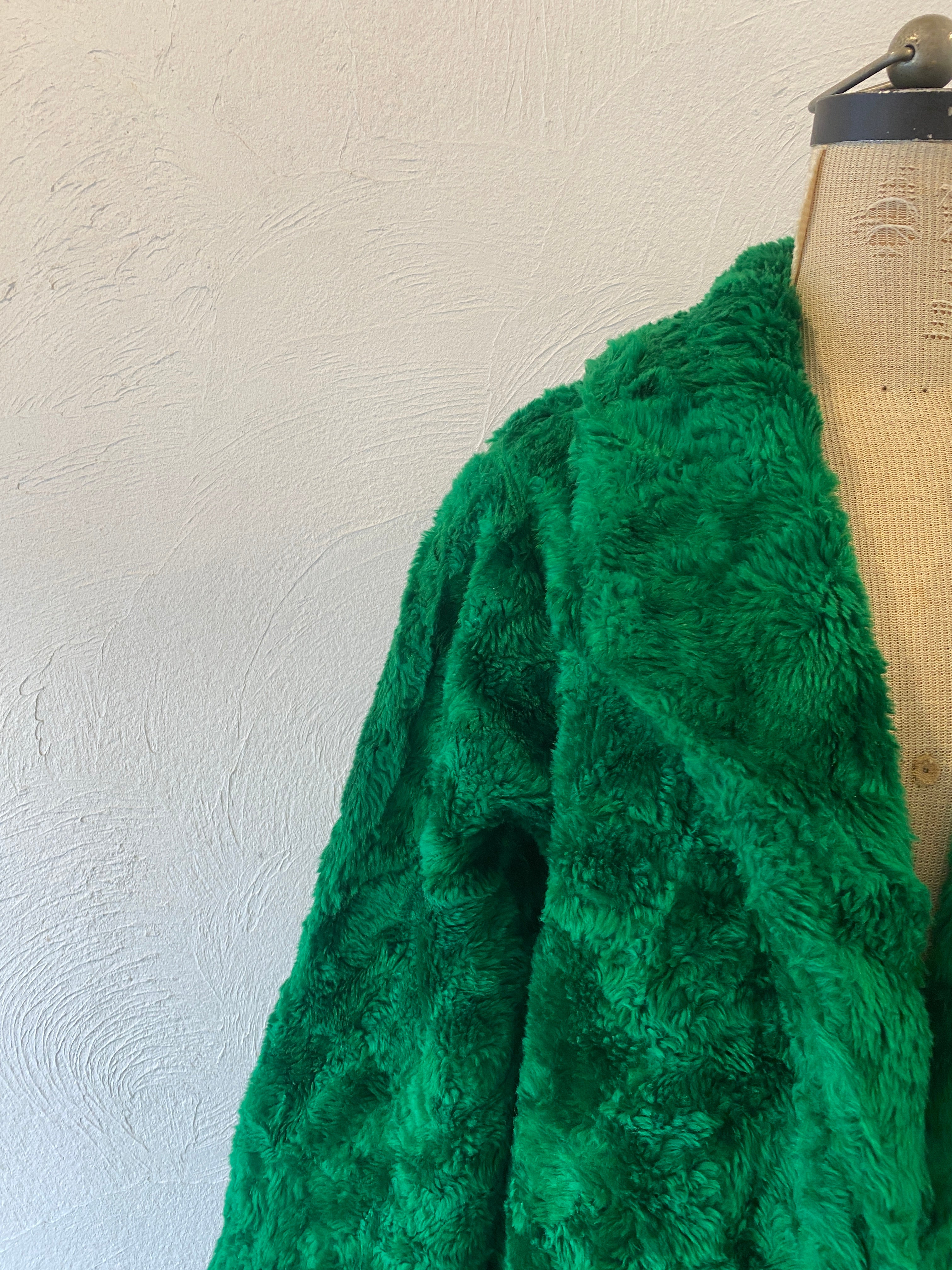 green fur coat