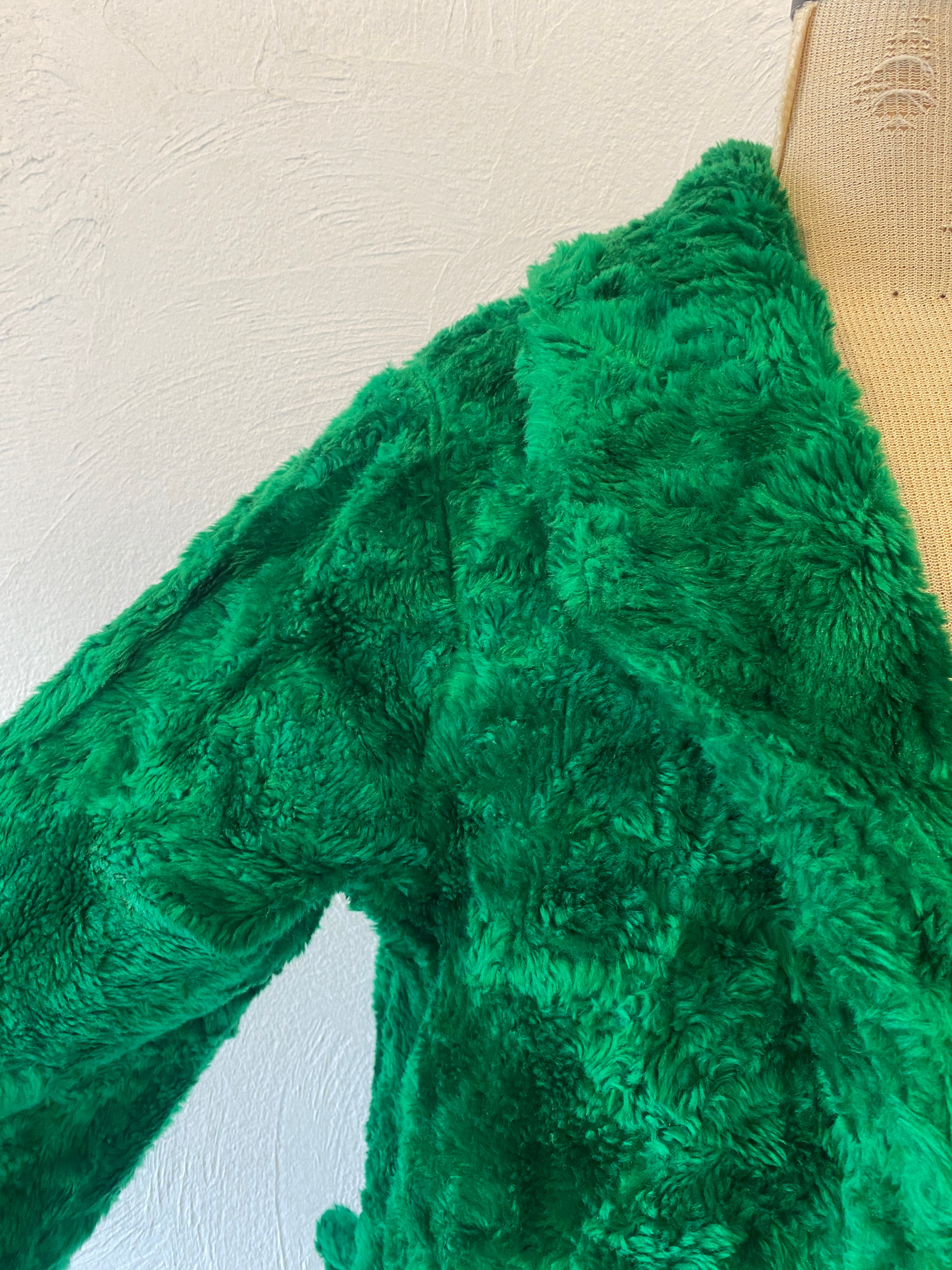 green fur coat