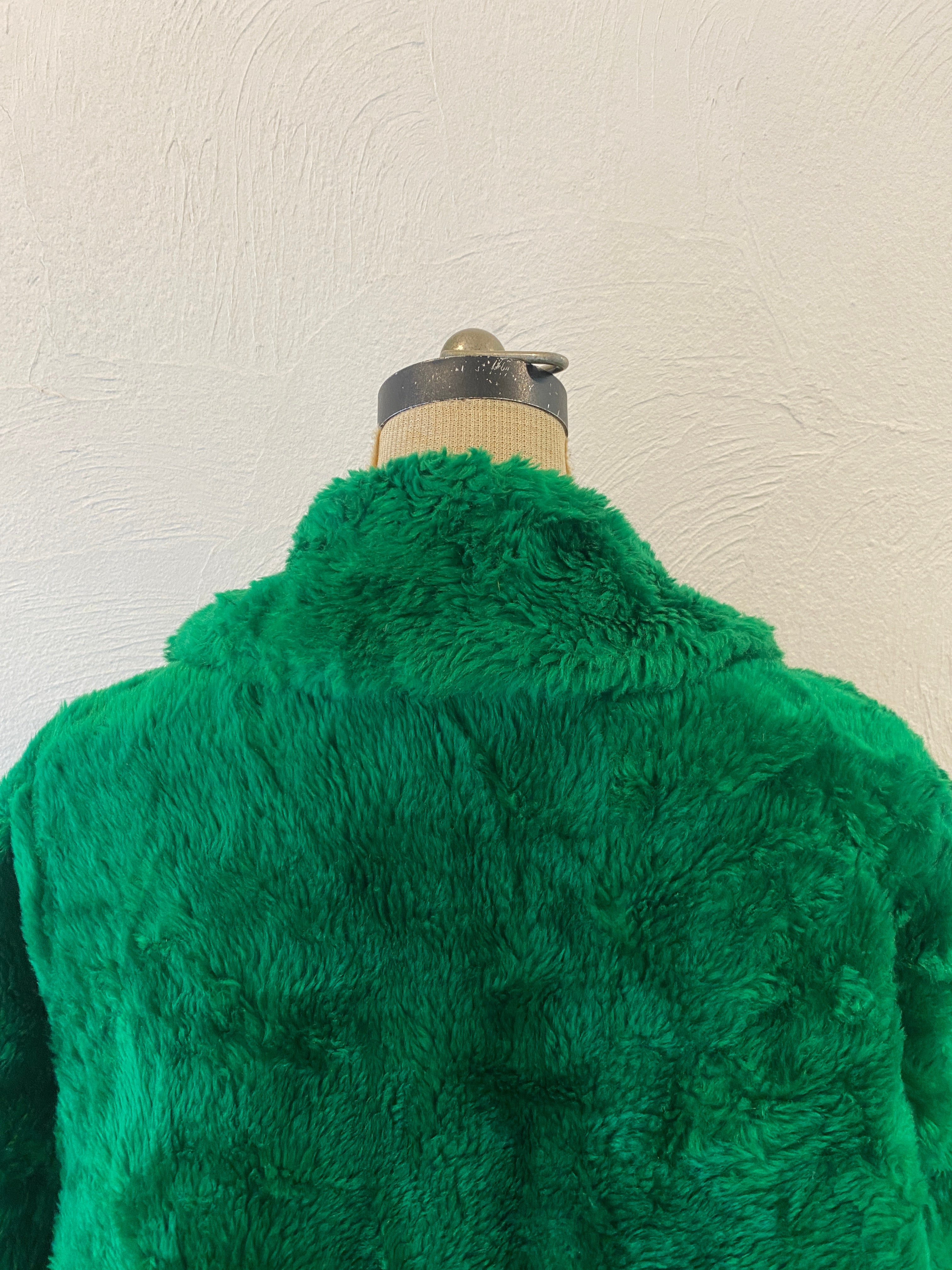 green fur coat