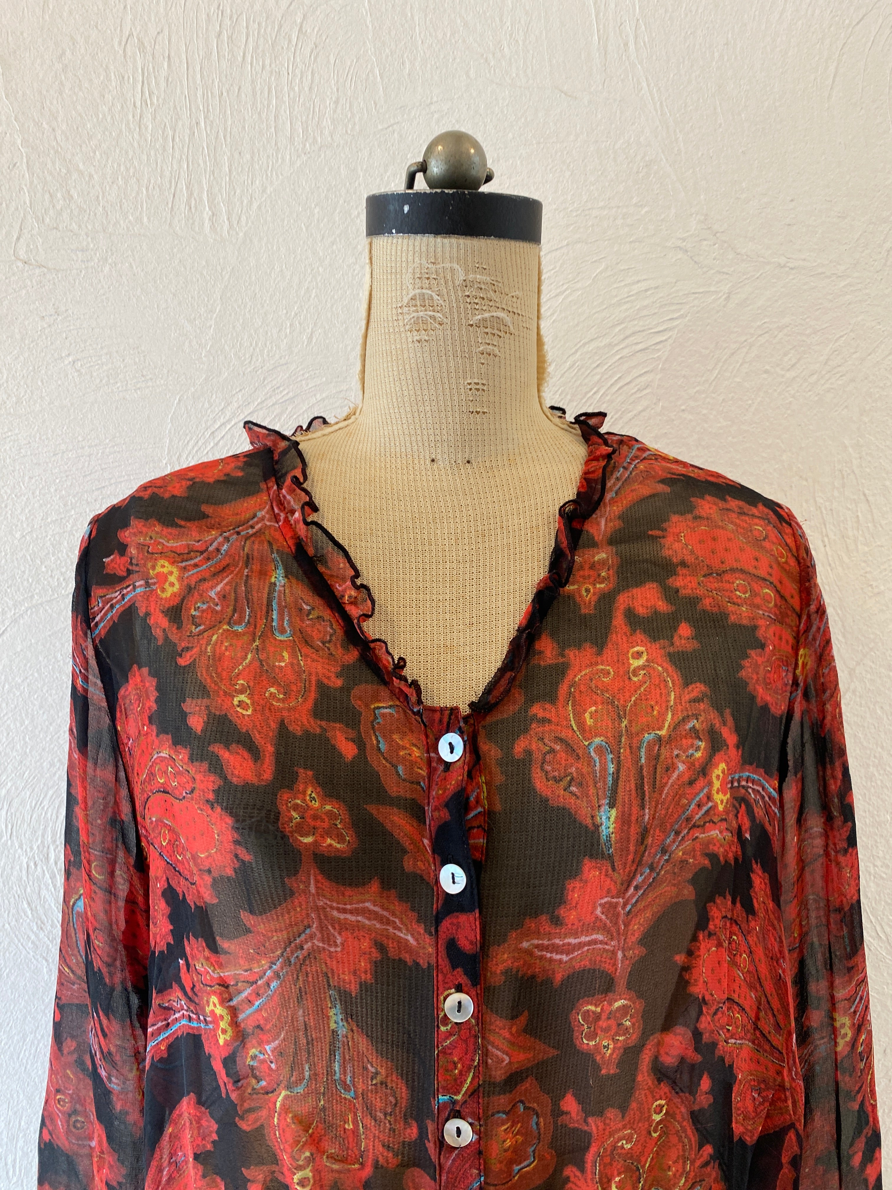 through paisly blouse