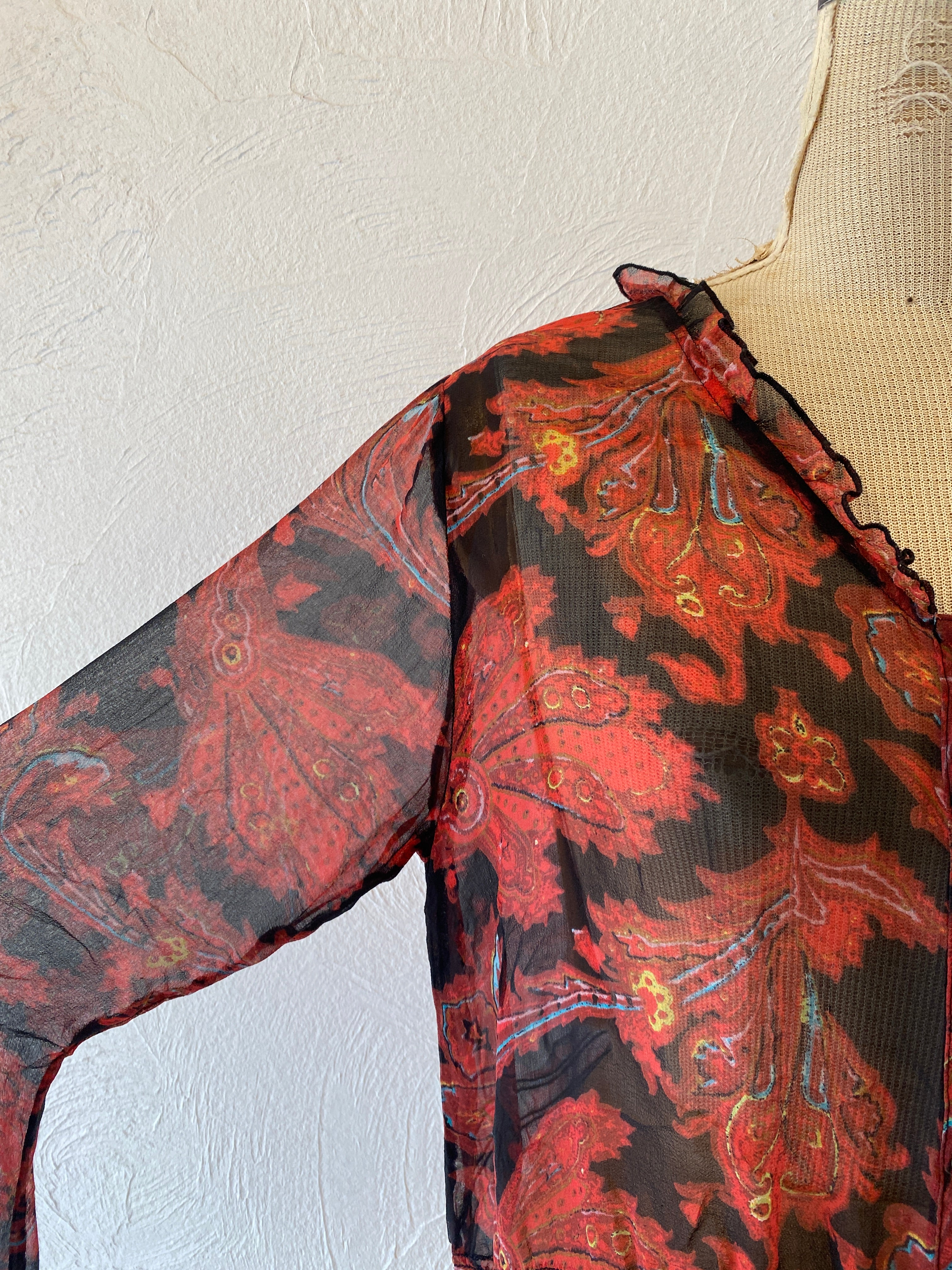 through paisly blouse