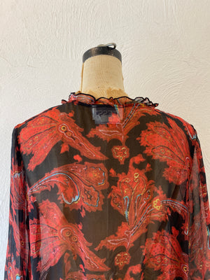 through paisly blouse
