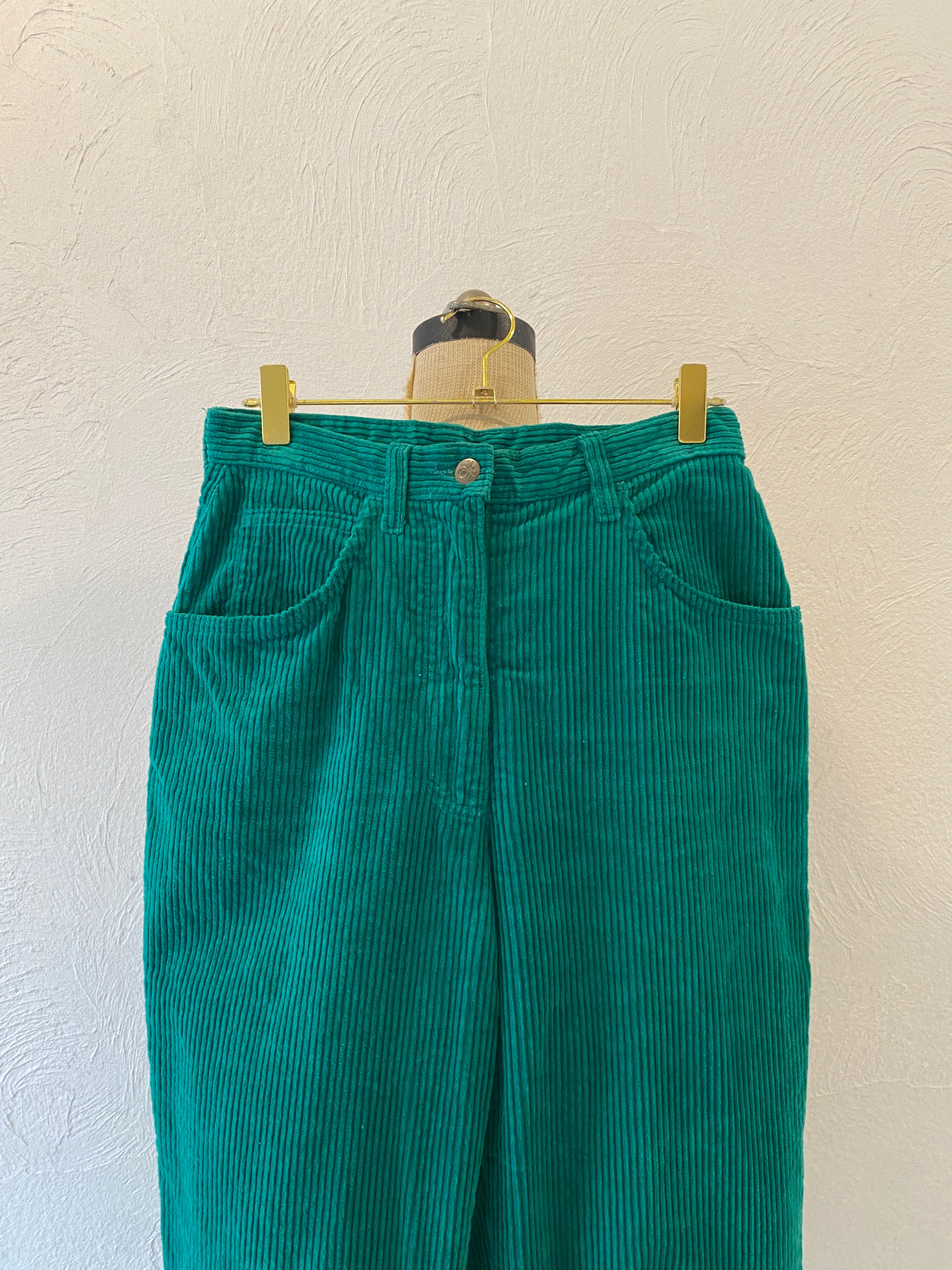 green corduroy pants