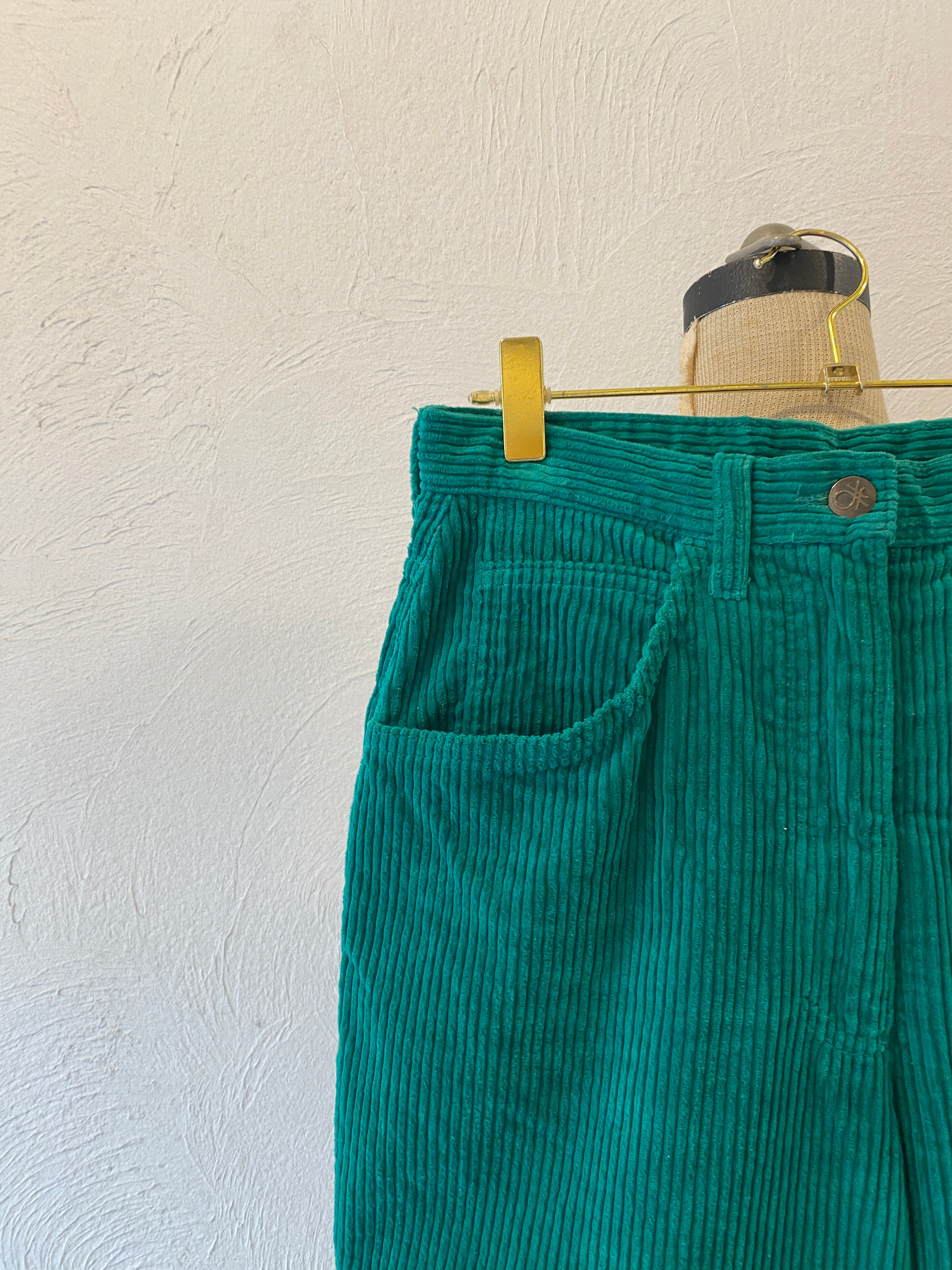 green corduroy pants