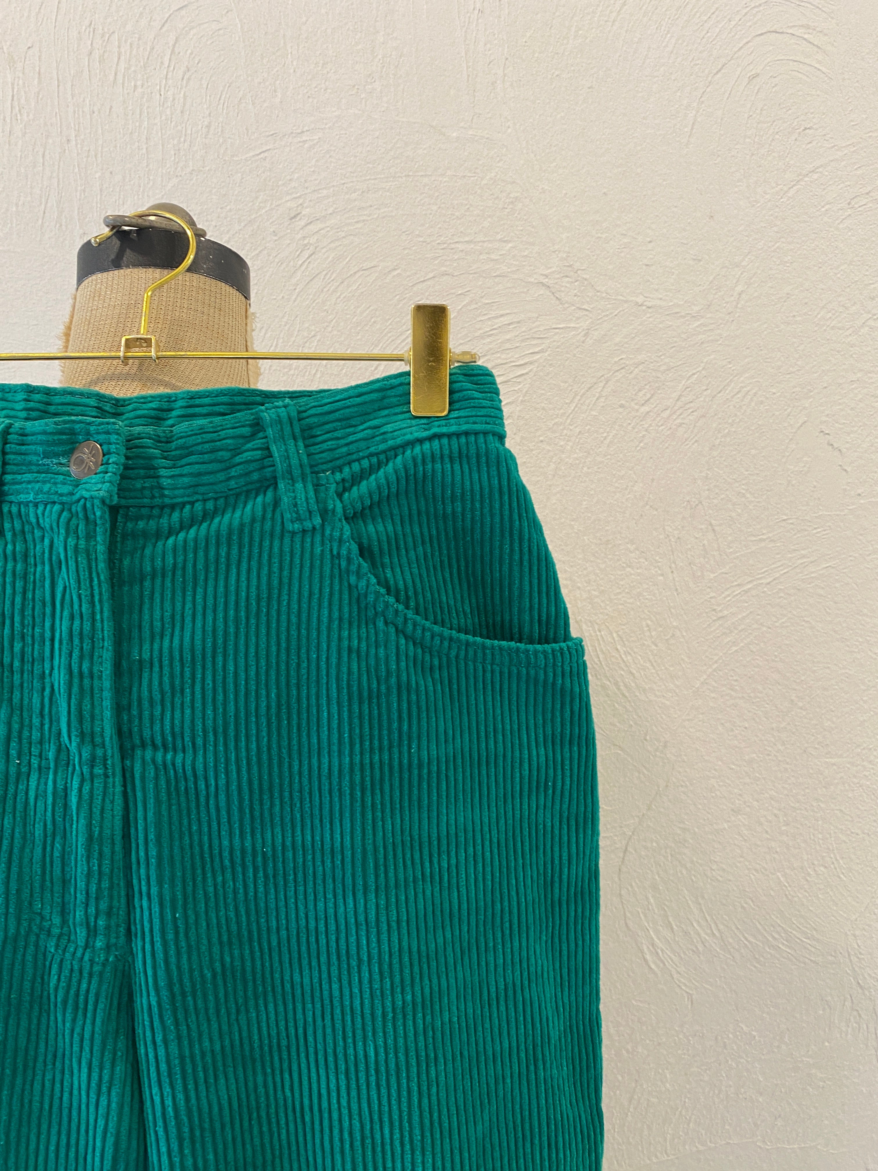 green corduroy pants