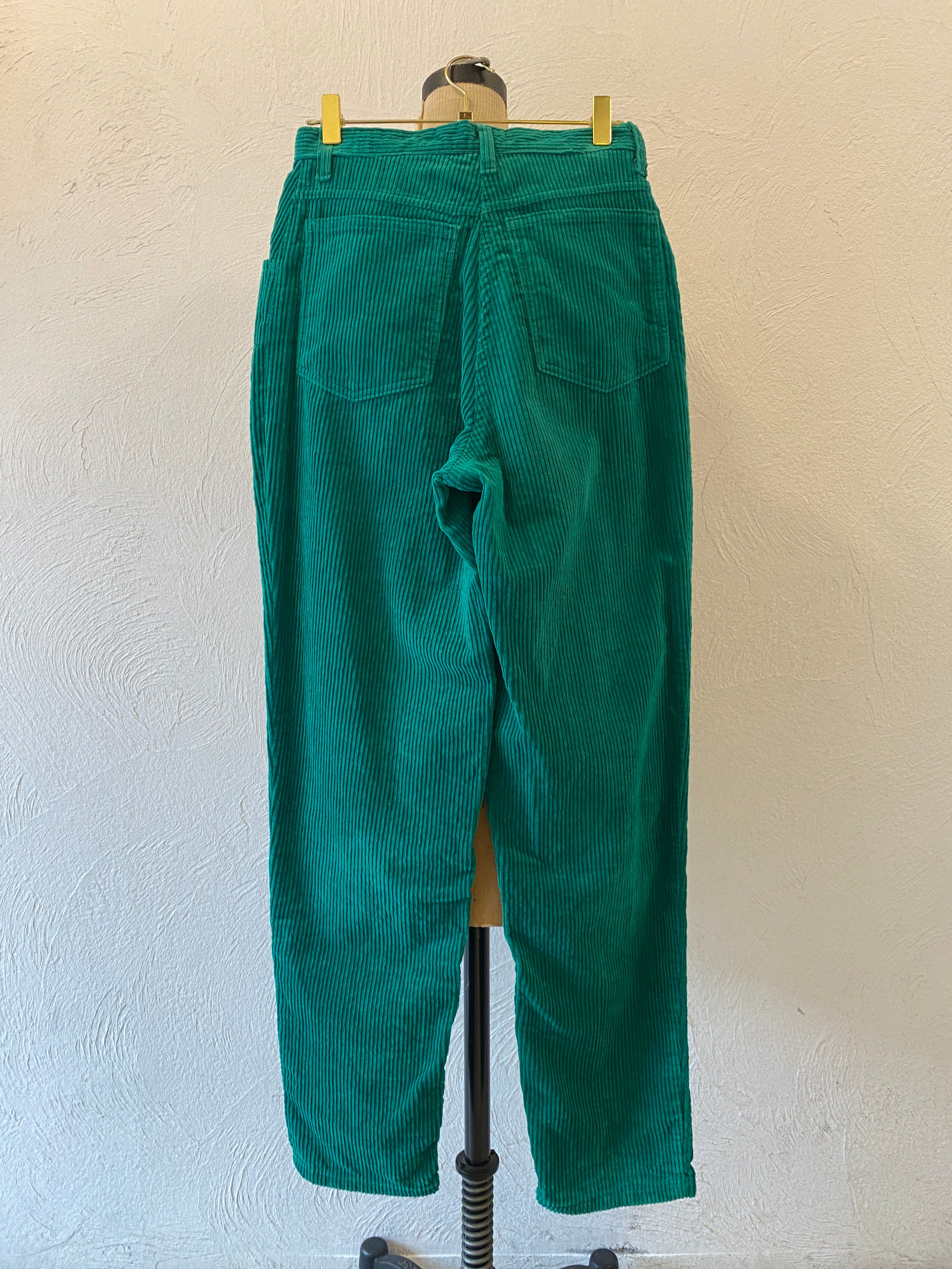 green corduroy pants