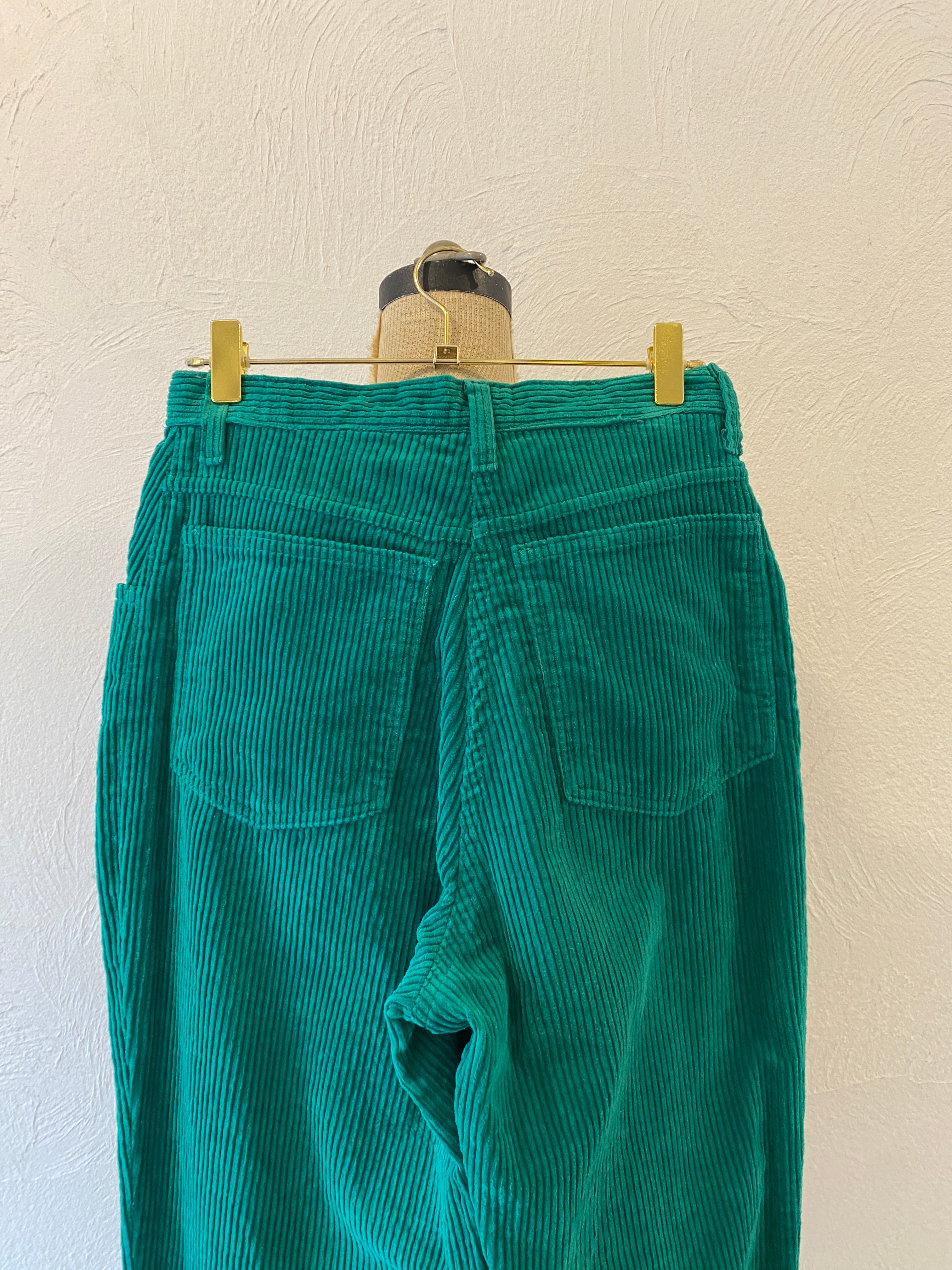 green corduroy pants