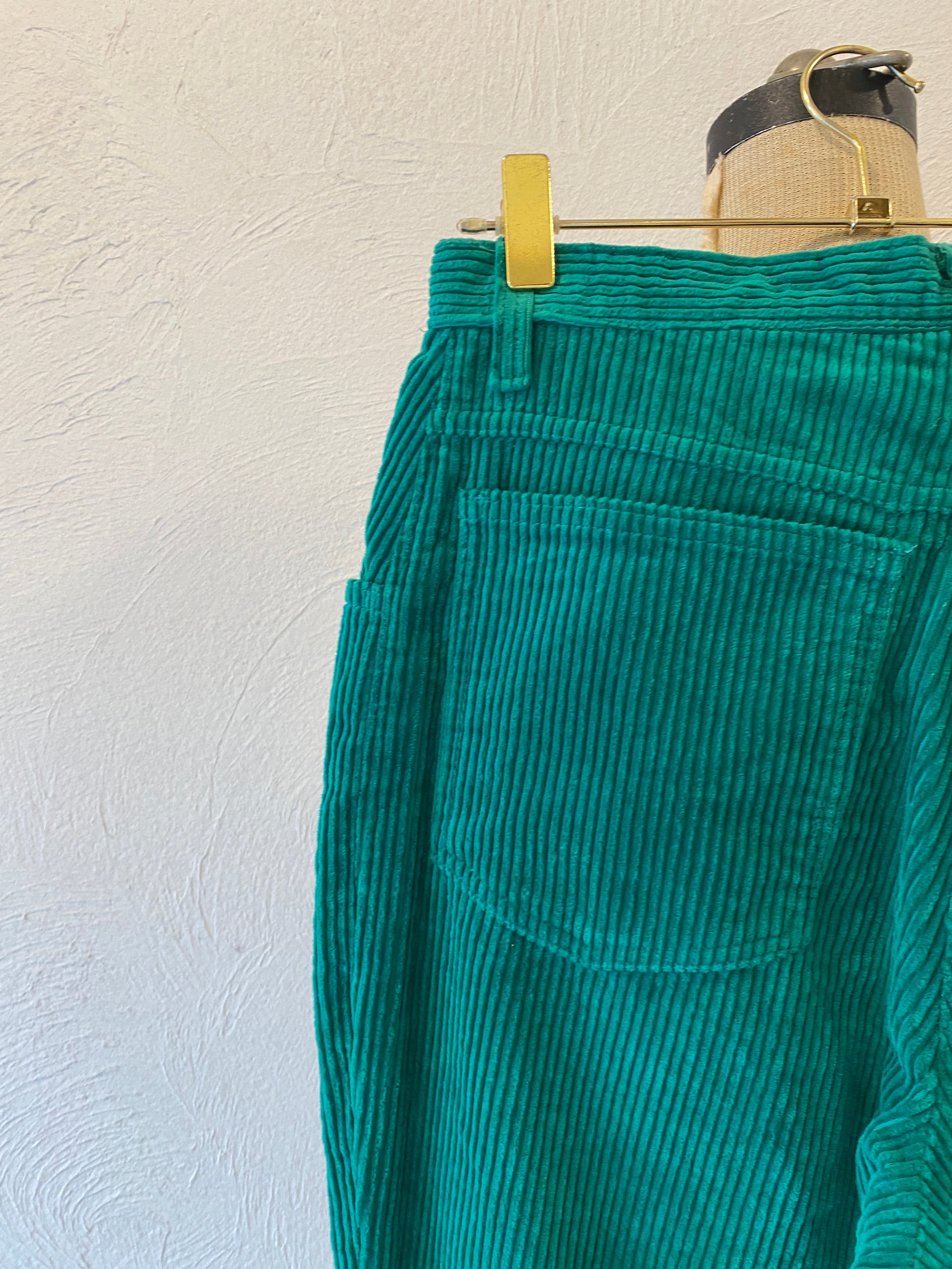green corduroy pants