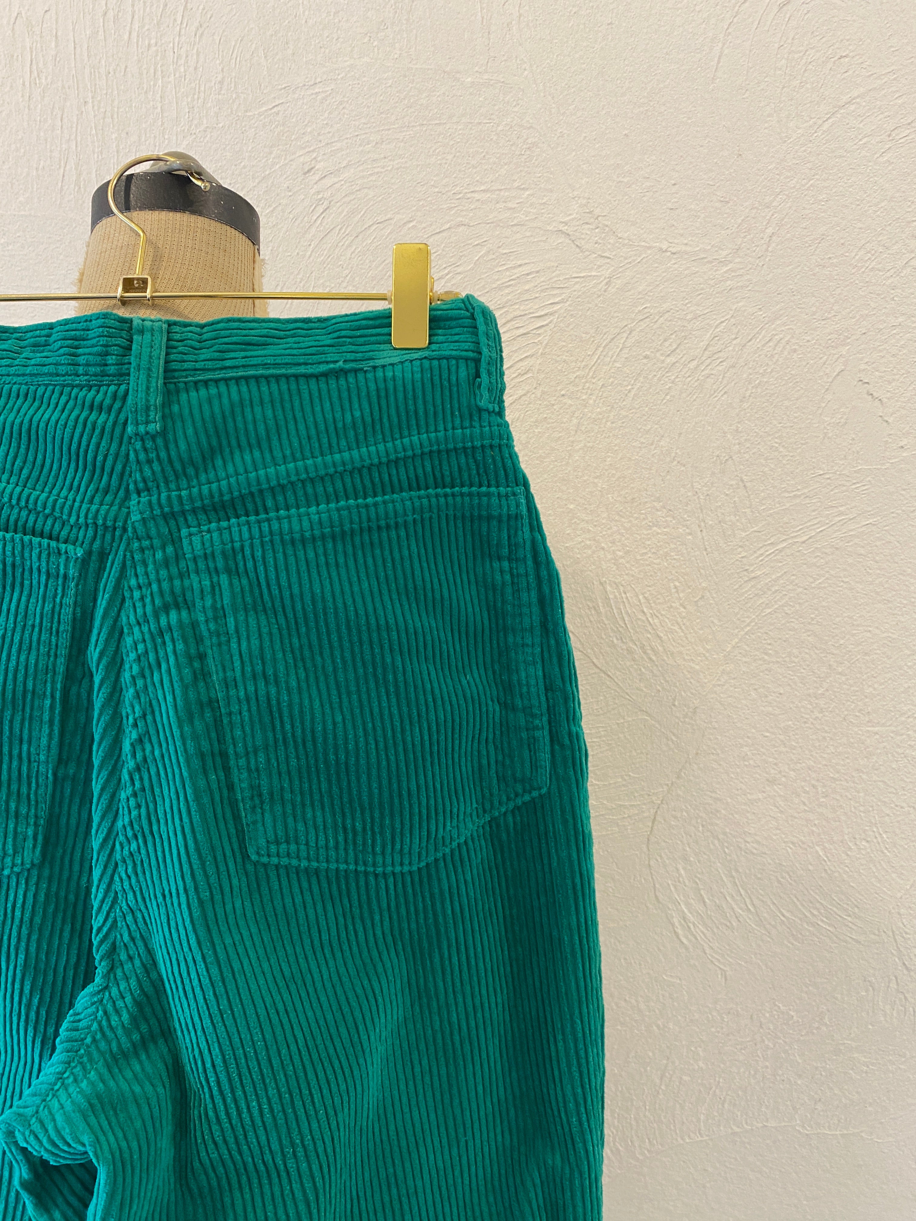 green corduroy pants
