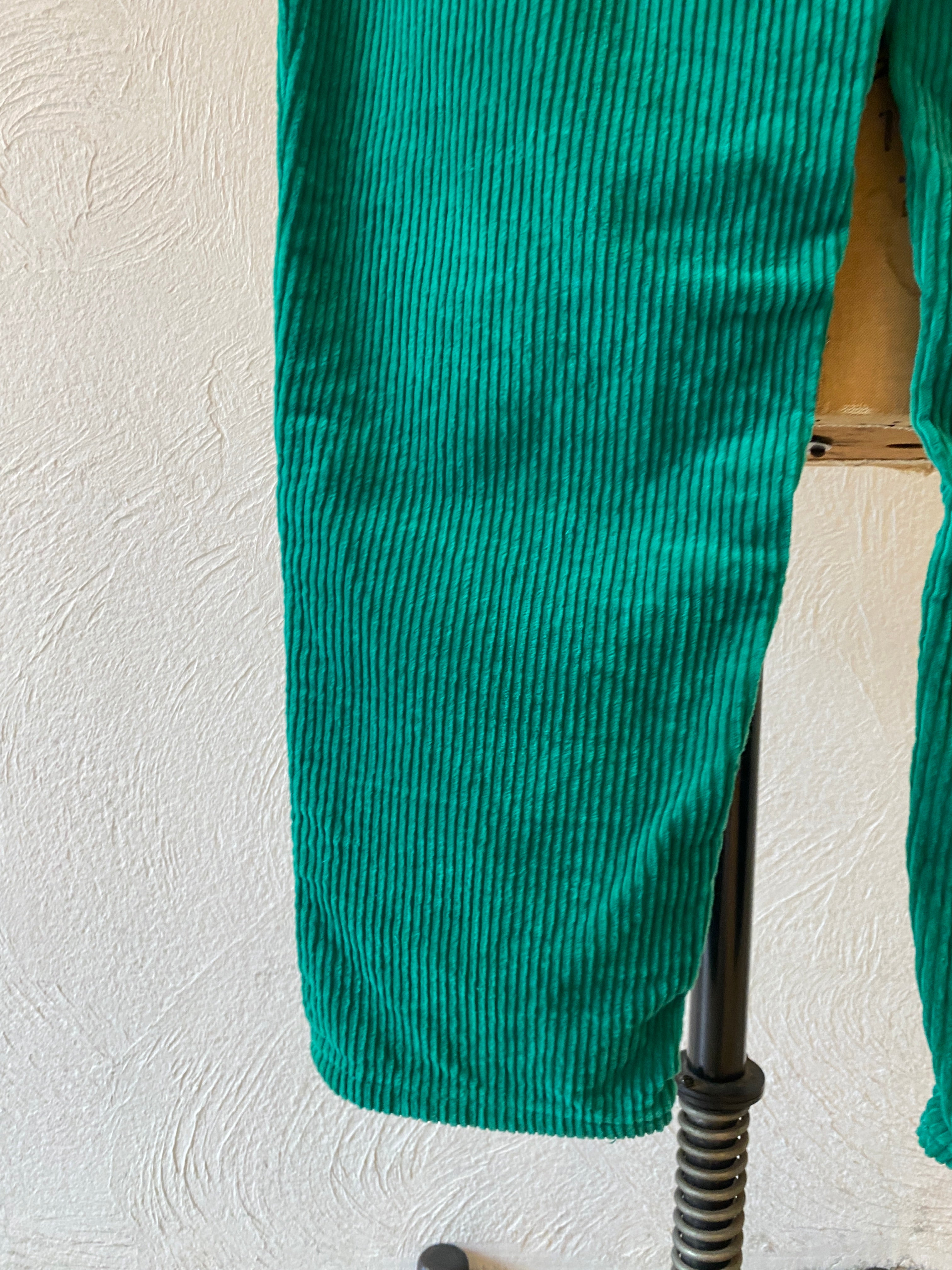 green corduroy pants