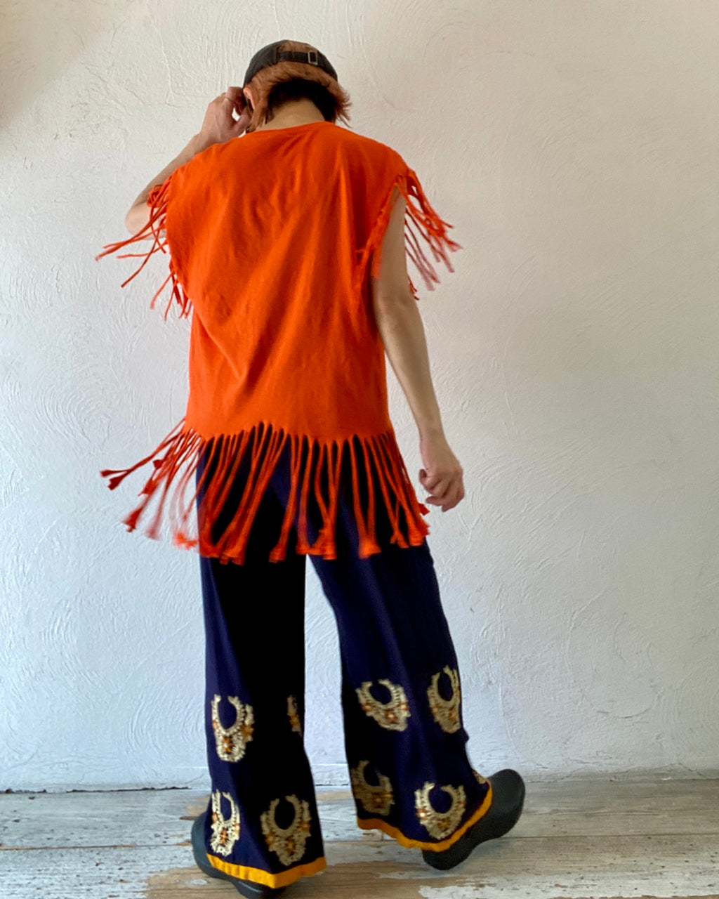 deep orange fringe T